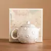 Gilded Silver Ceramic Teapot
