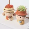 107462-f6fc27.webp Charming Cartoon Cactus Succulent Flower Pot