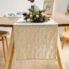 111883-ce98cf.webp Elegant Daisy Tassel Table Runner